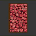 Fresh Pink Fruits Filled in Wooden Crate on Dark Background