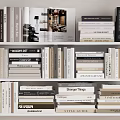 Neatly Arranged Books and Magazines on White Bookshelf with Various Titles and Sizes