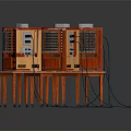 Vintage Red And Gray Computer Equipment With Control Panels On Orange Stands