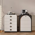 Modern White and Black Chest of Drawers with Decorative Items on Top in Room Interior
