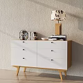 Modern White Filing Cabinet With Multiple Drawers And Decorative Items On Top