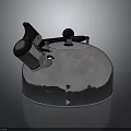 Silver Metallic Water Boiling Kettle With Black Handle Top Button Shiny Surface Modern Design
