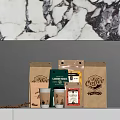 Coffee Paper Bags With Cups Beans And Packaging On White Counter