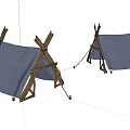 Two Outdoor Camping Tents With Wooden Frames And Blue Canvas Covers