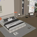 Double Bed With Gray White Bedding Floor Lamp Bedside Table And Wooden Floor