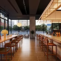 Modern Wooden Cafe Interior With Large Ceiling Light Coffee Machines And Shelves
