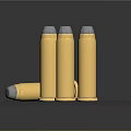 Yellow Bullets With Gray Tips Three Standing And One Lying On Dark Background