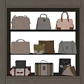Stylish Leather Handbags and Vintage Suitcases on Three Tiered Display Shelf