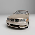 Beige Sporty Sedan Front View With Modern Grille And Headlights Design