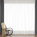 Dark Outer and White Sheer Double Layer Curtains by Window with Wooden Floor and Chair
