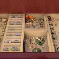 Indoor Scene With Multiple Room Sections Staircase Furniture And Miniature Figures