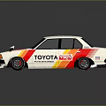 Toyota RSC White Race Car With Red And Yellow Stripes And Sponsor Logos