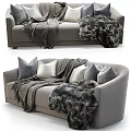Plush Double Sofa Featuring Gray Pillows Soft Blanket And Faux Fur Throw