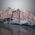 Garden Landscape Rockery Design Featuring Layered Pink Purple Blue Stone With Reflective Surface Texture