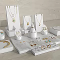 Modern White Jewelry Display Shelves Showcasing Necklaces Earrings Bracelets And Rings