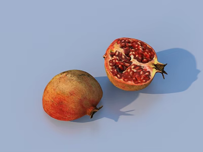 Ripe Whole Pomegranate and Cut Open Half Displaying Juicy Red Seeds 3d model
