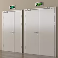 Silver Safety Exit Doors With Green Directional Signs In Building