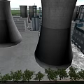 Industrial Plant Exterior Featuring Tall Concrete Cooling Towers And Surrounding Buildings