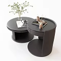 Two Modern Black Round Coffee Tables With Vase Magazine And Aromatherapy Sticks