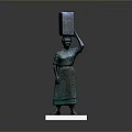 Woman Statue Standing With Square Object Balanced On Head On White Base