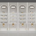 White Beauty Display Shelves With Arched Tops And Gold Accents For Cosmetic Products
