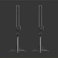 Two Industrial Metal Clamps With Sturdy Steel Construction And Modern Design