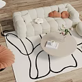 Modern Beige Sofa and Coffee Table Set With Orange Pillows Rug and Vase Flowers