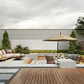 Stylish Courtyard Garden With Wooden Deck Outdoor Seating Sunshade Umbrella And Green Plants