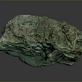 Natural Raw Green Stone With Rough Surface And Earthy Color Tones For Decor