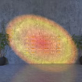 Gray Wall With Yellow Red Light Projection Arranged Items And Green Plants In Black Pots