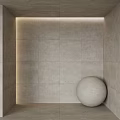 Minimalist Gray Tiled Wall Interior With Recessed Lighting And Spherical Corner Decor