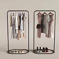 Stylish Clothes On Modern Clothing Racks With Various Styles And Shoes