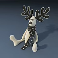 Plush Reindeer Shaped Doll With Large Antlers And Star Patterned Scarf Sitting On Gray Background