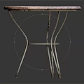 Round Furniture Table with Pink White Patterned Top and Ornate Metal Legs