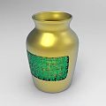 Decorative Ornament Set Featuring Golden Vase With Green Geometric Pattern