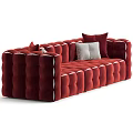 Burgundy Velvet Three Seater Sofa With Tufted Design And Decorative White Cushions