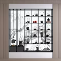 Elegant Chinese Style Tea Sets Displayed On Shelves With Landscape Painting