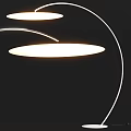 Sleek Modern Floor Lamp Featuring Curved Stand And Round Illuminated Shade