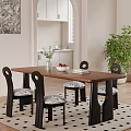 Modern Wooden Dining Table Set With Four Patterned Cushion Chairs Vase Fruit Bowl And Books