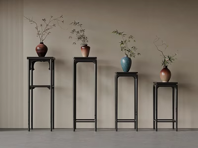 Sleek Black Flower Stands with Four Vases and Green Foliage Against Light Wall Background 3d model