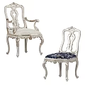 Ornate Leisure Chairs with Silver Carved Frame Light Fabric And Dark Blue Patterned Cushions