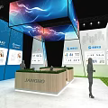 JIANGHO Exhibition Booth Design With Blue White Displays Digital Screens And Green Grass Decor