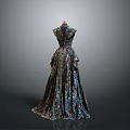 Dark Patterned Long Dress Displayed On Mannequin With Gray Background