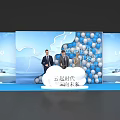 Launch Device At New Era Ceremony Featuring Three People And Blue Balloons