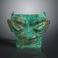 Ancient Bronze Mask Sculpture With Intricate Facial Features And Patina Green Surface