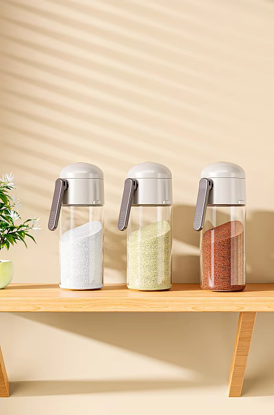 Three Transparent Spice Jars With Gray Lids Containing Different Spices 3d model