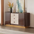 Elegant Dark Brown Storage Cabinet With Woven Drawer Panels Gold Base And Top Decorative Items
