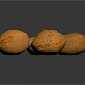 Five Fresh Orange Speckled Almonds Placed on Black Reflective Surface
