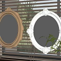 Decorative Gold And White Framed Mirrors Hanging On Wall With Window Blinds And Green Plants