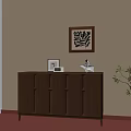 Wooden Cabinet With Framed Photo Sculpture Wall Art And Potted Plant Interior Decor
